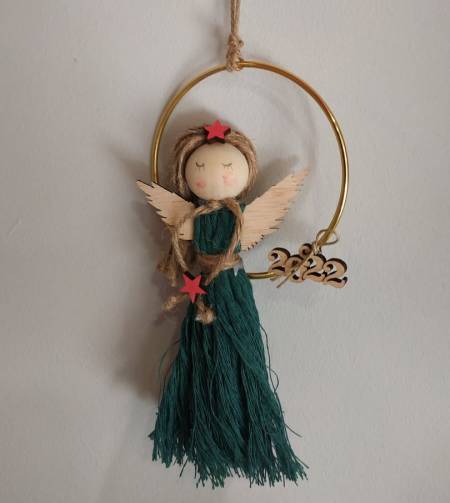 Macrame little angel in a gold wreath