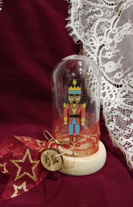 Wooden bell with nutcracker
