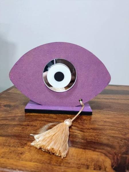 Wooden eye with mirror base and colored wooden element