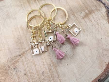 Certificate keychain with square eye, perforated cross and K60 tassel